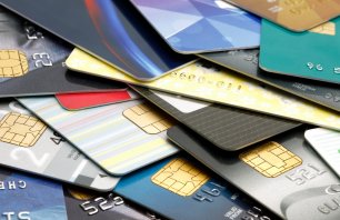 Colorful stack of credit cards and shopping gift cards. Macro with extremely shallow dof.